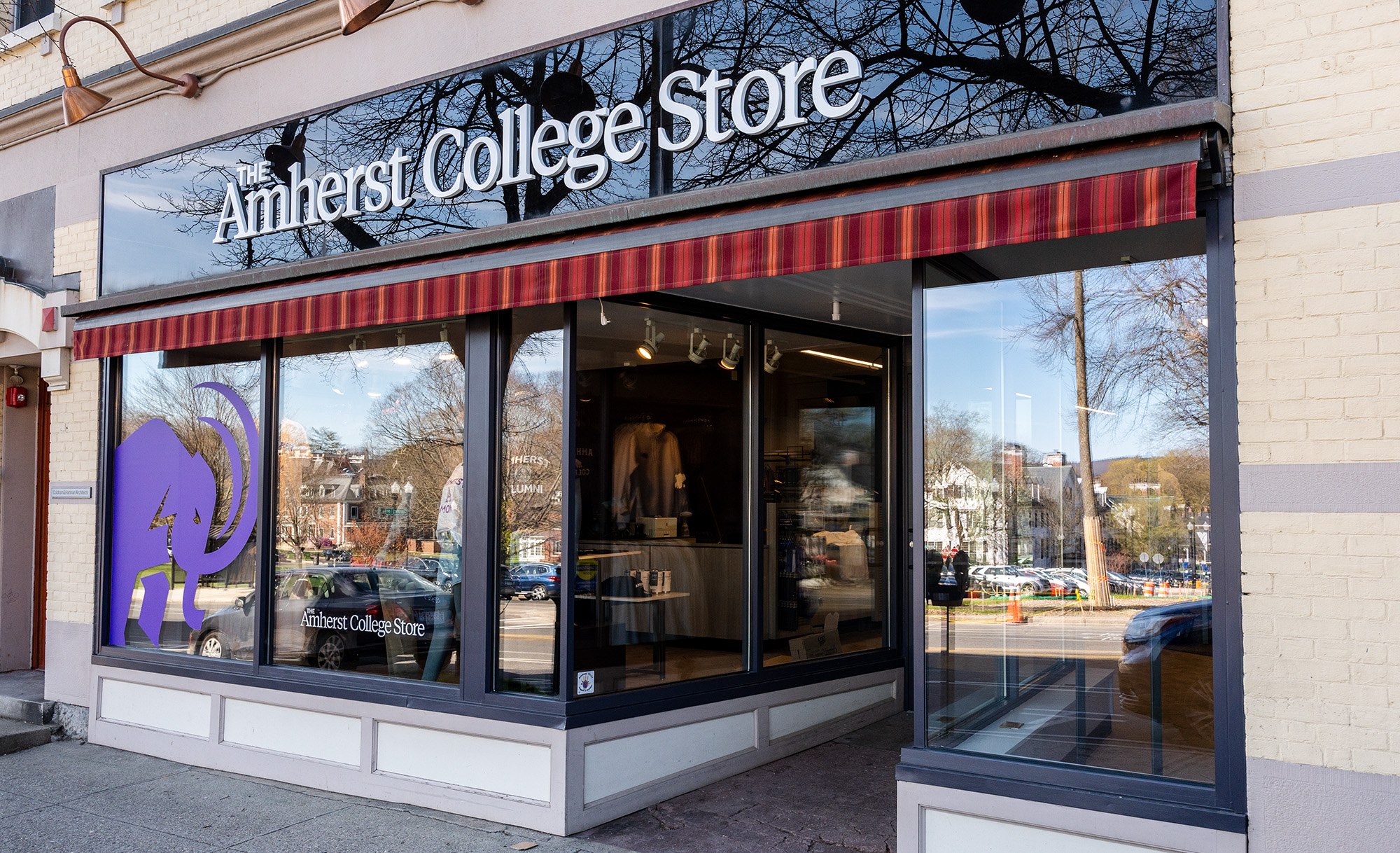 A storefront with a sign that says Amherst College Store
